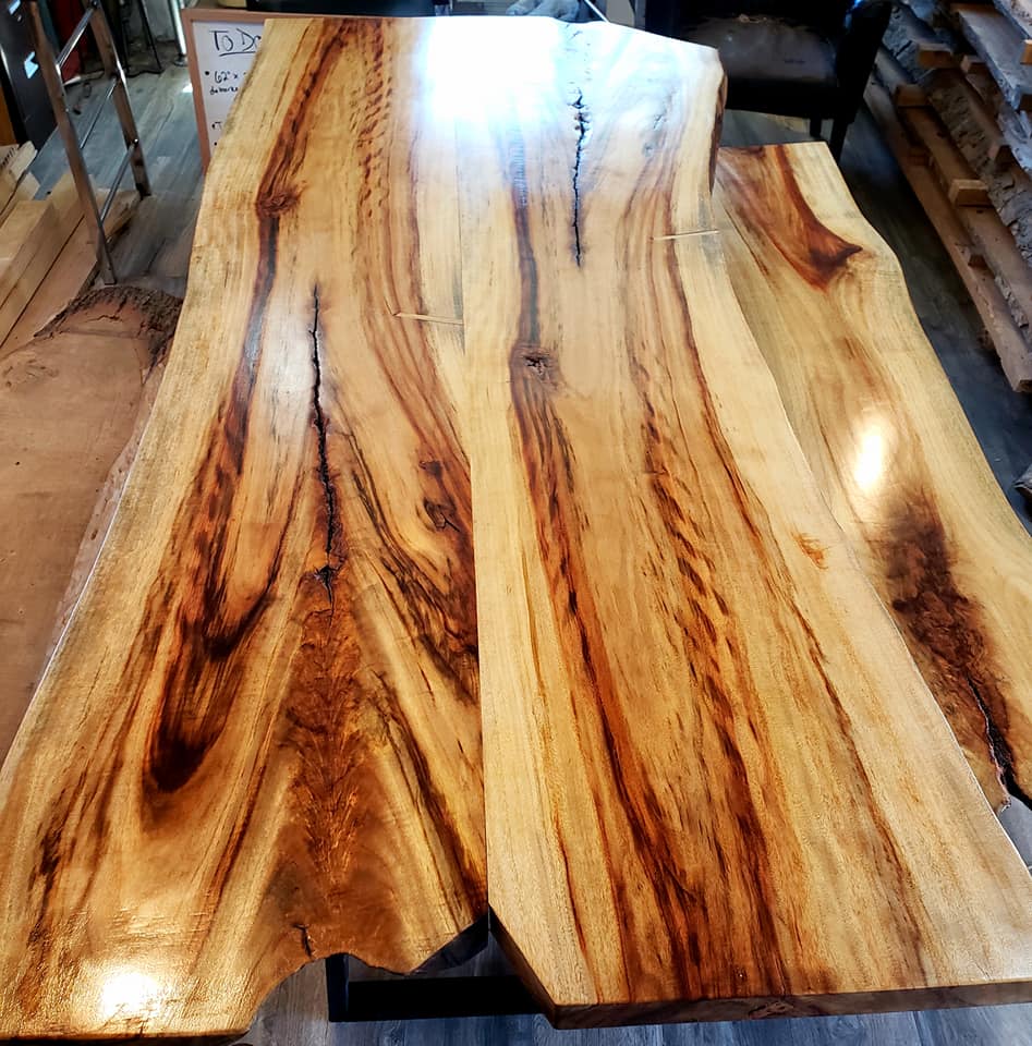 Multi-board live-edge dining tabletop with dramatic figured grain